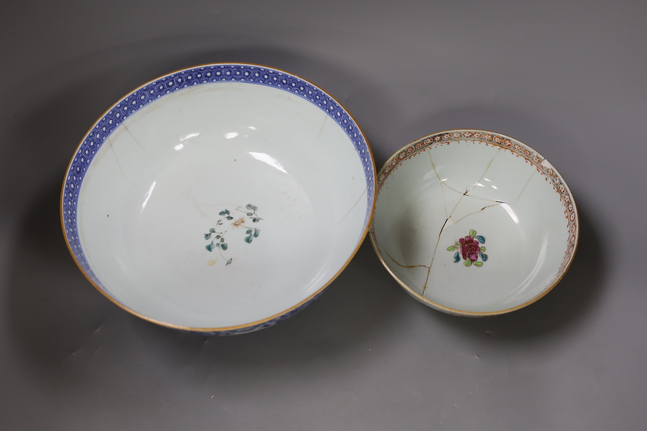 Two 18th century Chinese export famille rose bowls (a.f) largest 26cm diameter